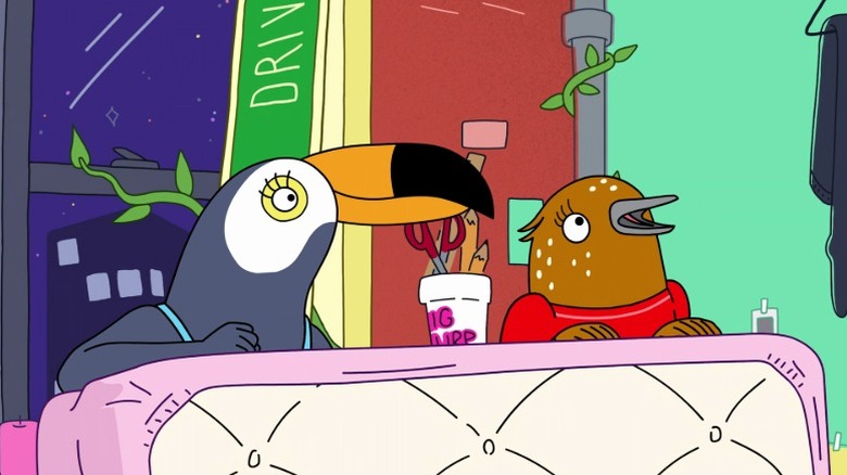 Tuca and Bertie standing behind a mattress on Tuca & Bertie S1E6