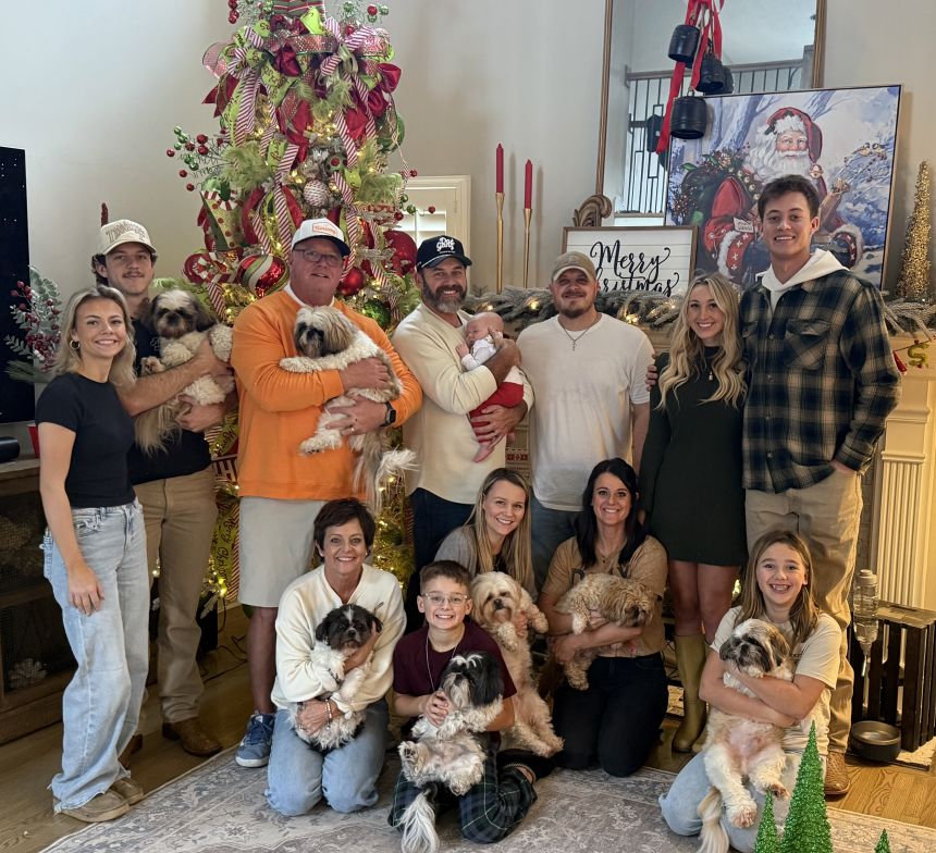 Donna Dillon pictured with her husband, her children, grandchildren and dogs.