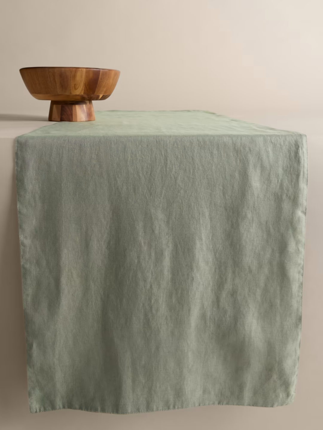 A green linen table runner from M&amp;S
