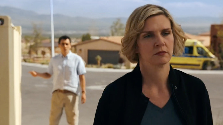 Carlos Manuel Vesga as Manousos Oviedo and Rhea Seehorn as Carol Sturka in 