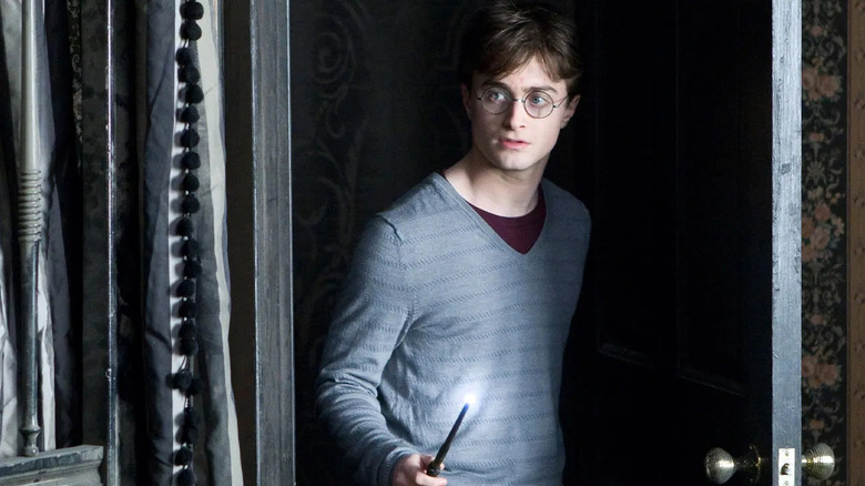 Harry looking around a corner in Harry Potter and the Order of the Phoenix