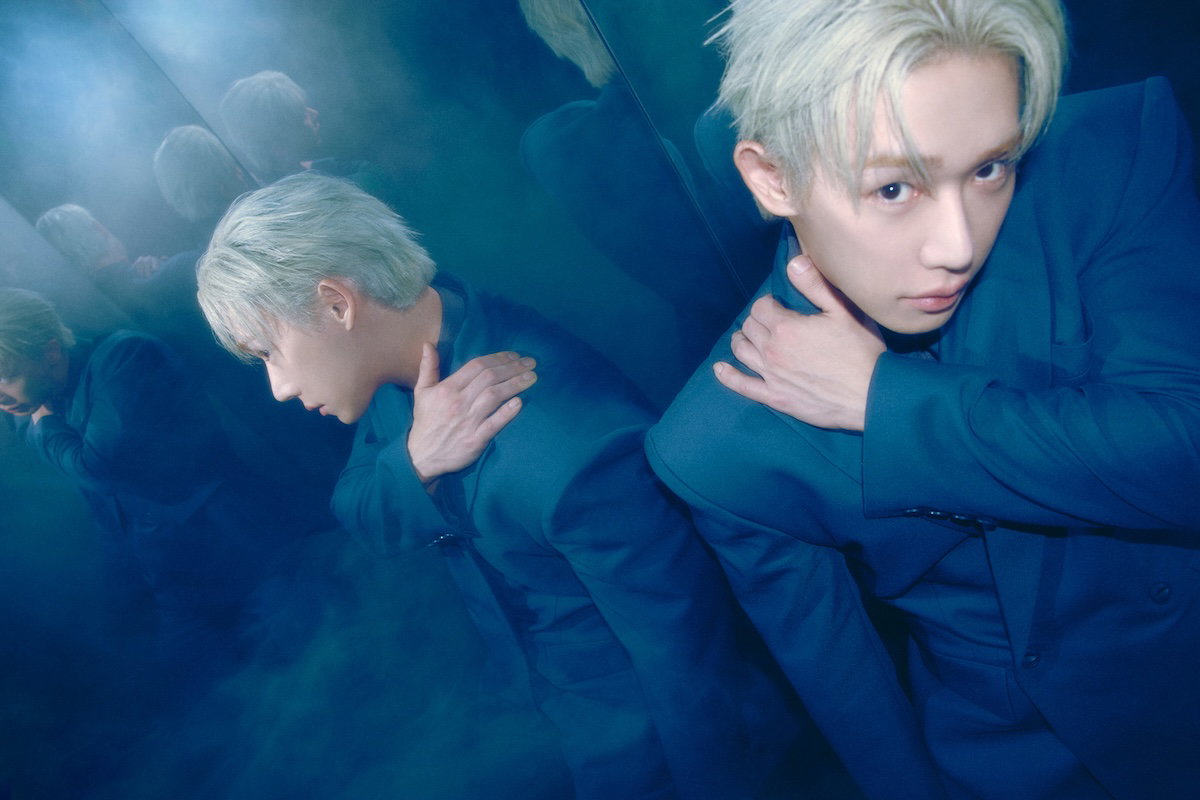 WONHO Core image leaning away from mirror