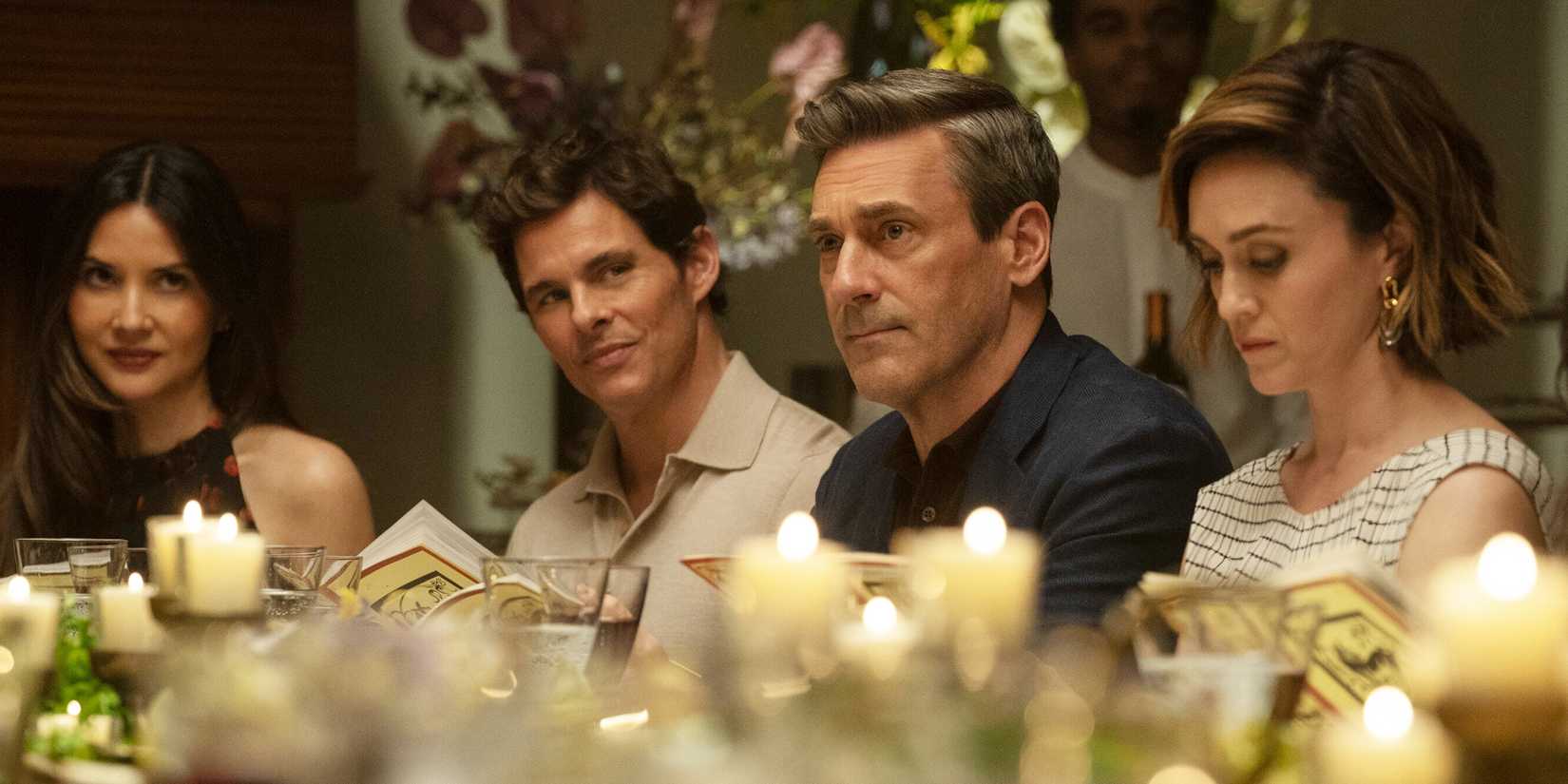 Olivia Munn's Sam, James Marsden's Ashe, and Jon Hamm's Coop sitting at a dinner table in Your Friends & Neighbors Season 2