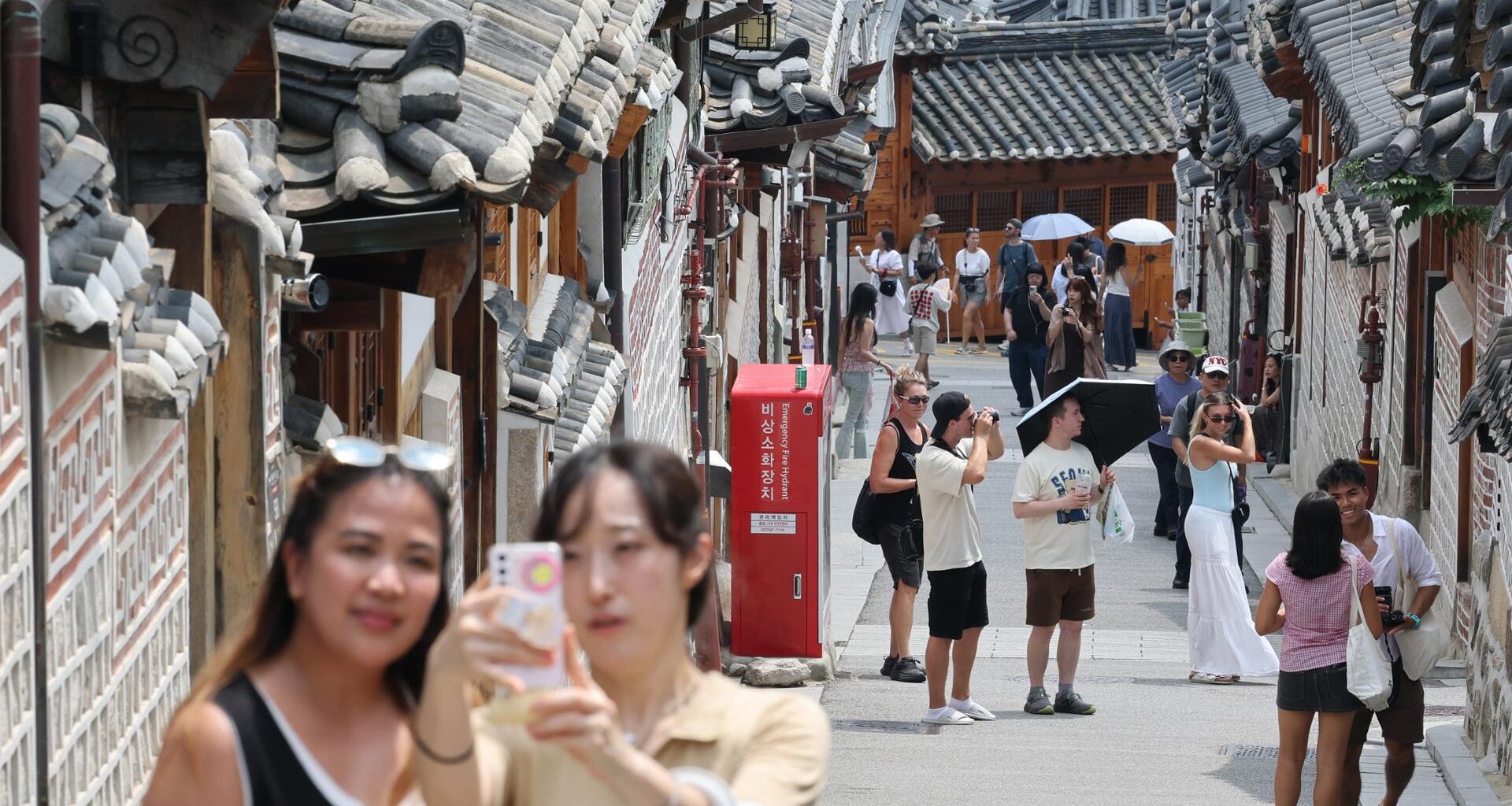 Tourists visit Bukchon Hanok Village in Seoul
