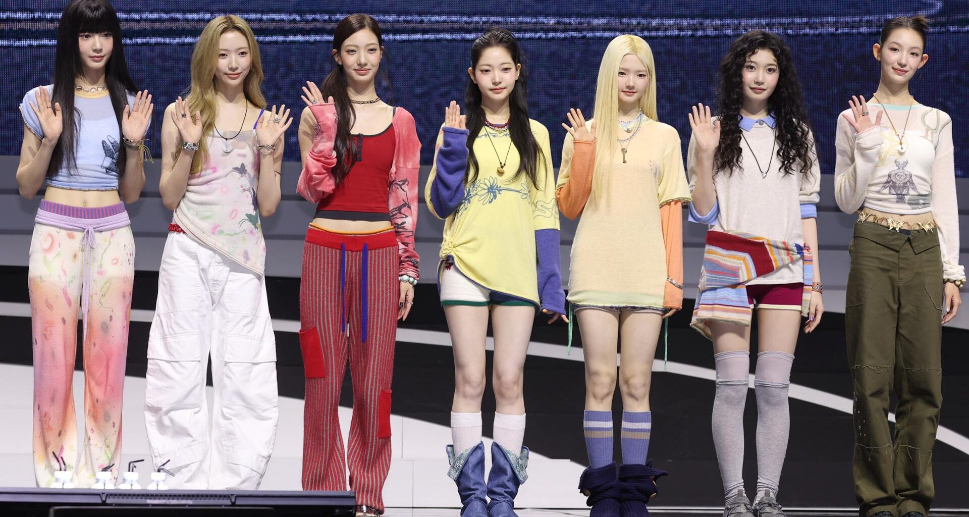 K-pop girl group TUIDE members, from left, Seah, Elena, Seoyeon, Jia, Seohee, Saki and Yi Hani, pose during a media showcase for the group