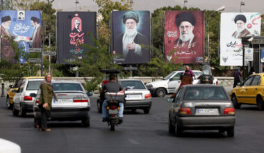 Banners with pictures of the late Supreme Leader of Iran, Ayatollah Ali Khamenei, are displayed on a street in Tehran