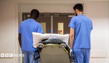 Medical staff walking in a hospital corridor