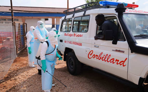 Health workers disinfect an ambulance at the Ebola Treatment Center at Bunia General Hospital in Ituri, on July 22, 2026.