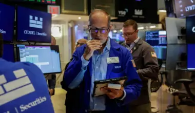 A trader working on the floor of the New York Stock Exchange, in New York City, on Aug 19.