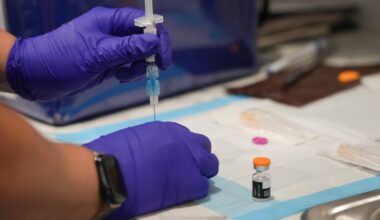 Diana Dur, public health nurse, prepares a measles vaccine at a mobile clinic in Upper Darby in July. Pennsylvania has reported 379 measles cases in 2026.