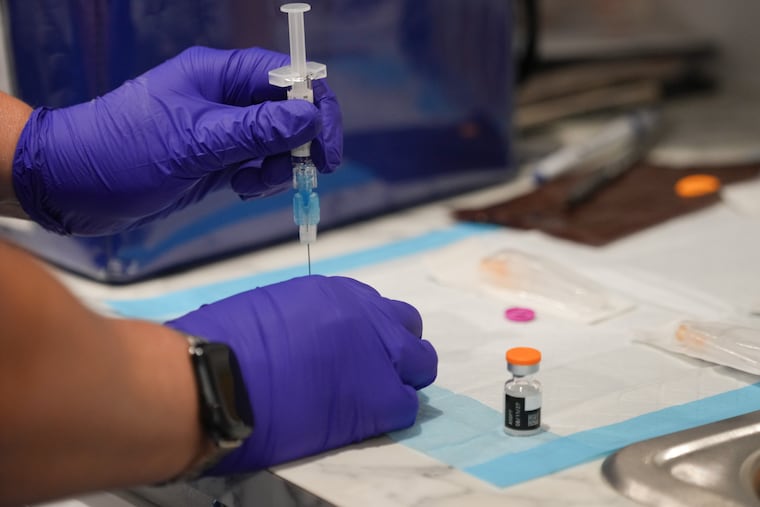 Diana Dur, public health nurse, prepares a measles vaccine at a mobile clinic in Upper Darby in July. Pennsylvania has reported 379 measles cases in 2026.