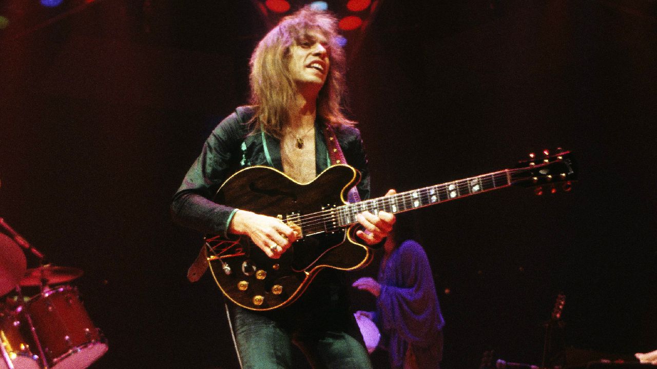 Steve Howe and Yes perform live on stage at Madison Square Garden in New York in June 1979