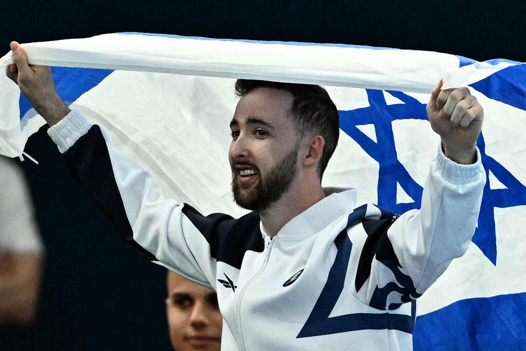 'Continued to deliver tremendous achievements for the State of Israel.' Dolgopyat (Photo: Lionel BONAVENTURE / AFP) דולגופיאט