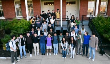 Student participants in the TekTrek startup accelerator gathered in front of their coworking space at the Presidio in San Francisco.