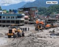 Workers dig through debris after deadly flash flooding - loop