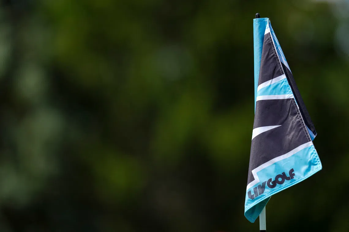 Aug 22, 2025; Detroit, Michigan, USA;  The LIV Golf logo is seen on the 14th green pin flag during the quarterfinals of the LIV Golf Michigan Team Championship at The Cardinal at Saint John's Resort. Mandatory Credit: Aaron Doster-Imagn Images/File Photo