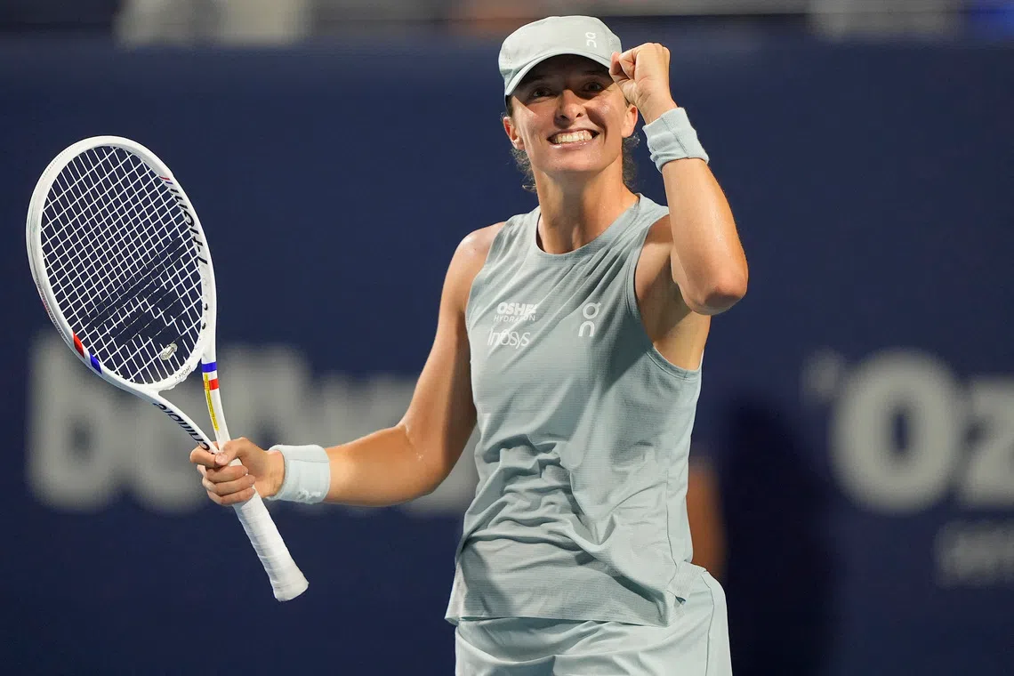 Iga Swiatek celebrates after reaching the Canadian Open final.