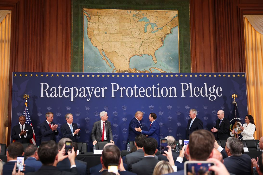 US President Donald Trump greets Louisiana Gov. Jeff Landry as he arrives to a roundtable on the Ratepayer Protection Pledge at the Environmental Protection Agency headquarters on July 23 in Washington, DC. The pledge is intended to shield taxpayers from the costs associated with electricity demands from the AI innovation boom.