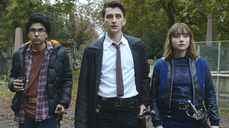 George (Ali Hadji-Heshmati), Anthony (Cameron Chapman), and Lucy (Ruby Stokes) standing next to each other on 