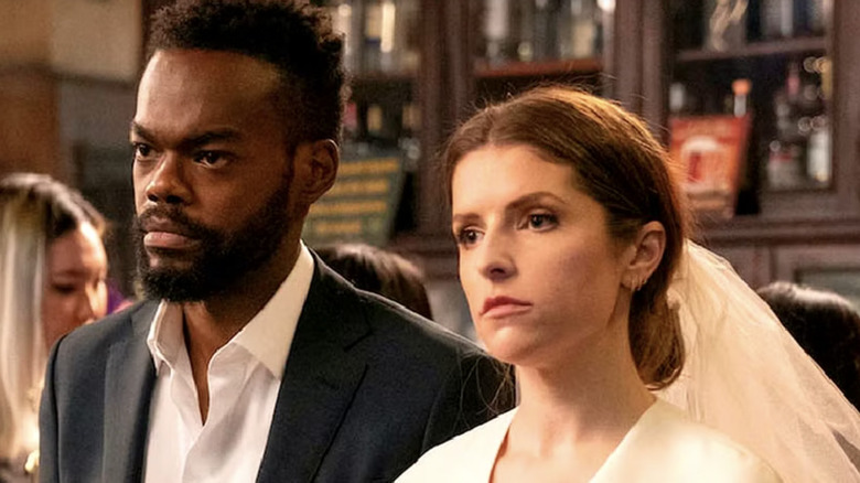 William ackson Harper and Anna Kendrick stand in a bar as their characters on 