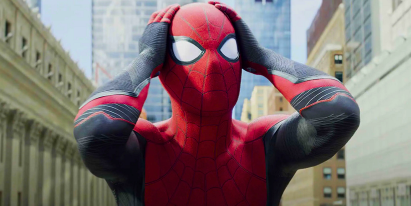 Tom Holland as Spider-Man in Far From Home looking worried with his hands on his head