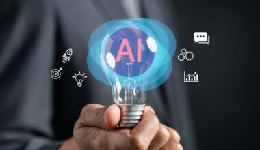 A light bulb with the letters AI inside of it and graphics around it.