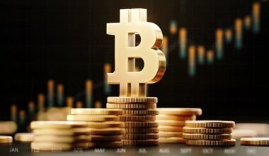 A Bitcoin symbol stands atop a pile of coins.
