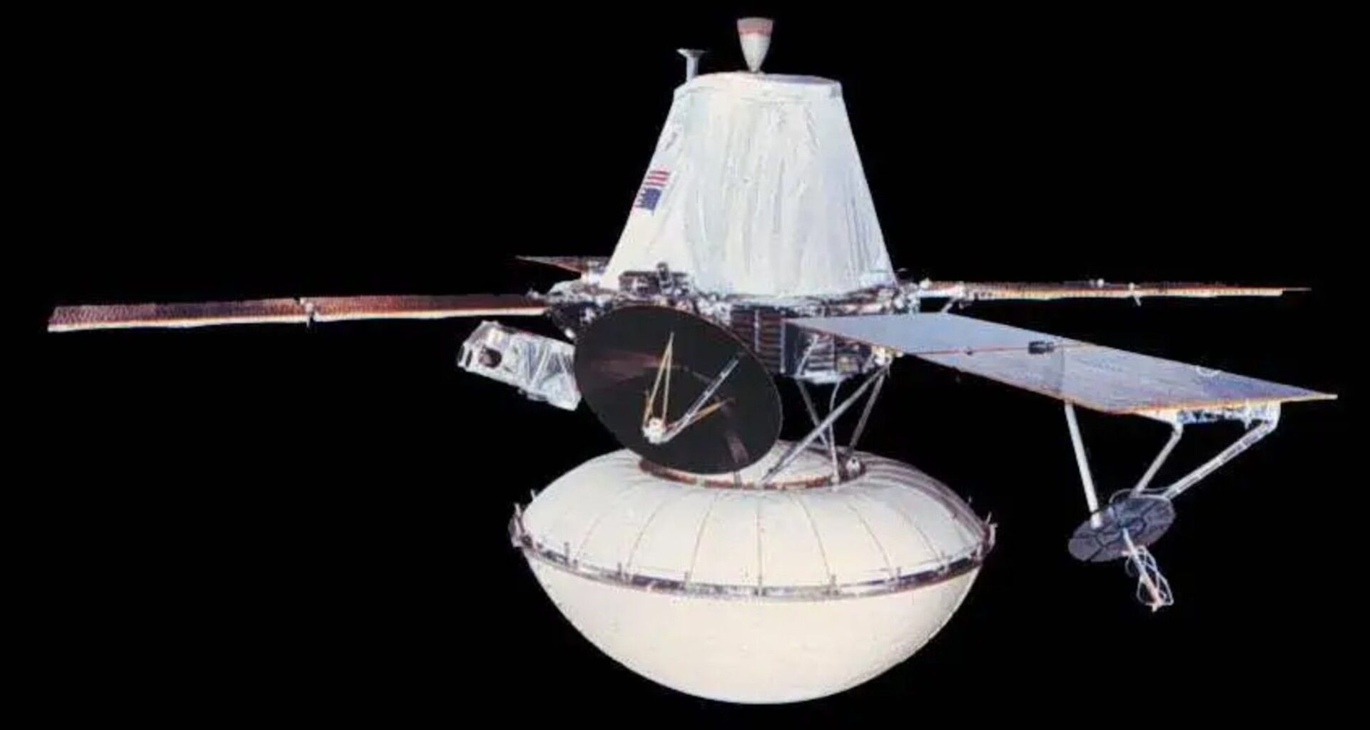 A photo of NASA's Viking 1 Mars orbiter with its Mars lander attached in a landing capsule.