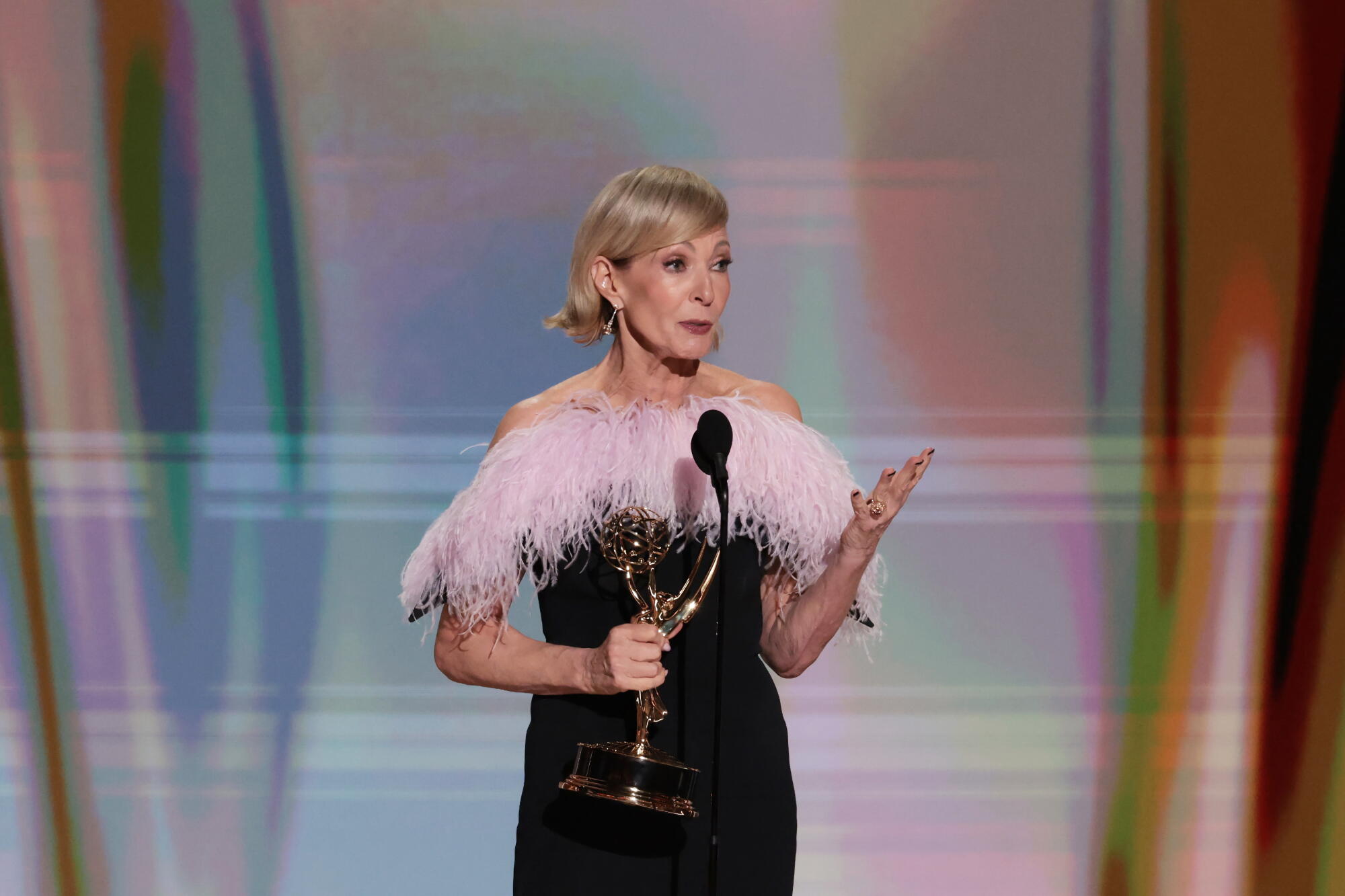 Allison Janney accepts her Emmy for supporting actress in a drama series for "The Diplomat" during the 78th Emmy Awards.