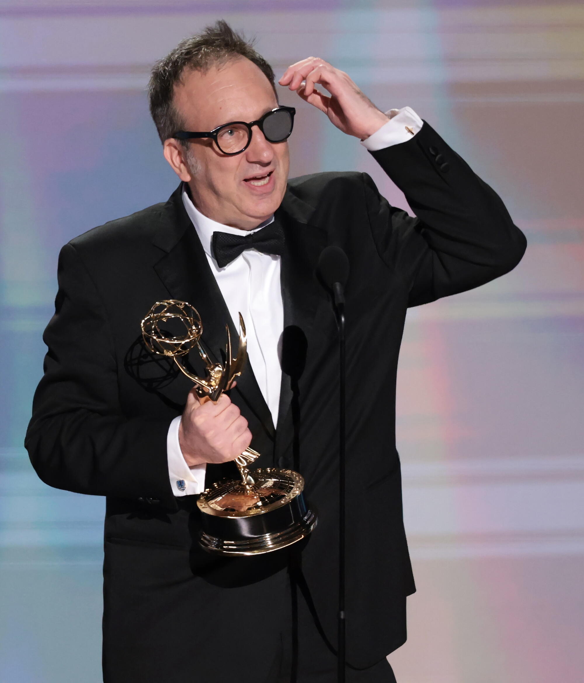 Saul Metzstein accepts his Emmy for directing in a drama series for "Slow Horses" during the 78th Emmy Awards.