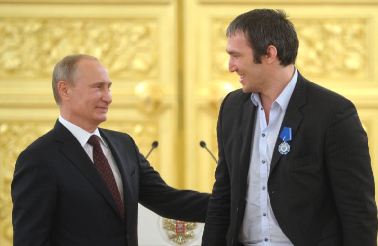 Russia's President Vladimir Putin greets captain Alexander Ovechkin as he meets with players, coaches and officials of team Russia during an award ceremony at the Kremlin in Moscow on May 27, 2014. [File: Alexei Druzhinin/Ria Novosti/Kremlin/Reuters]