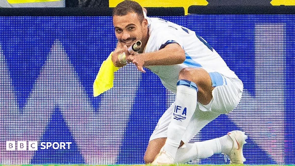 Israel's Sayed Abu Farhi sent off for appearing to mimic gun in goal celebration