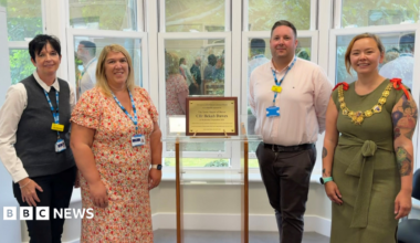 Kent and Medway Mental Health NHS Trust staff with Mayor of Dover, Councillor Bekah Dawes, unveiling a plaque at Coleman House in Dover