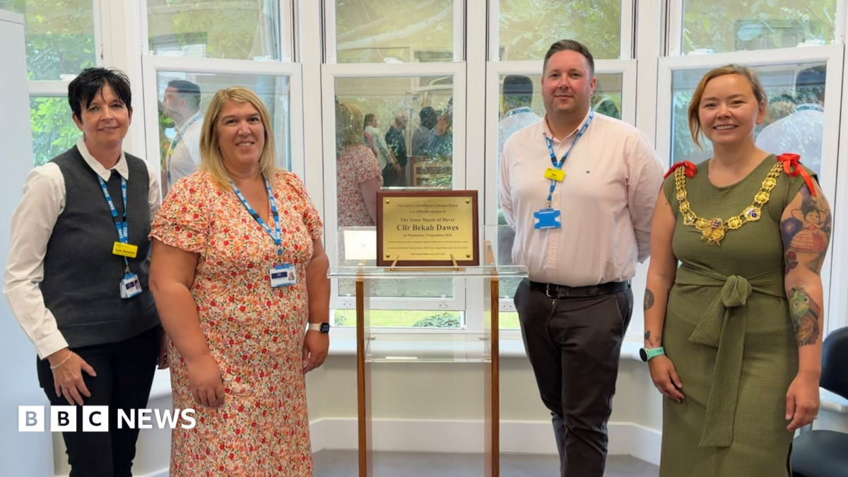 Kent and Medway Mental Health NHS Trust staff with Mayor of Dover, Councillor Bekah Dawes, unveiling a plaque at Coleman House in Dover