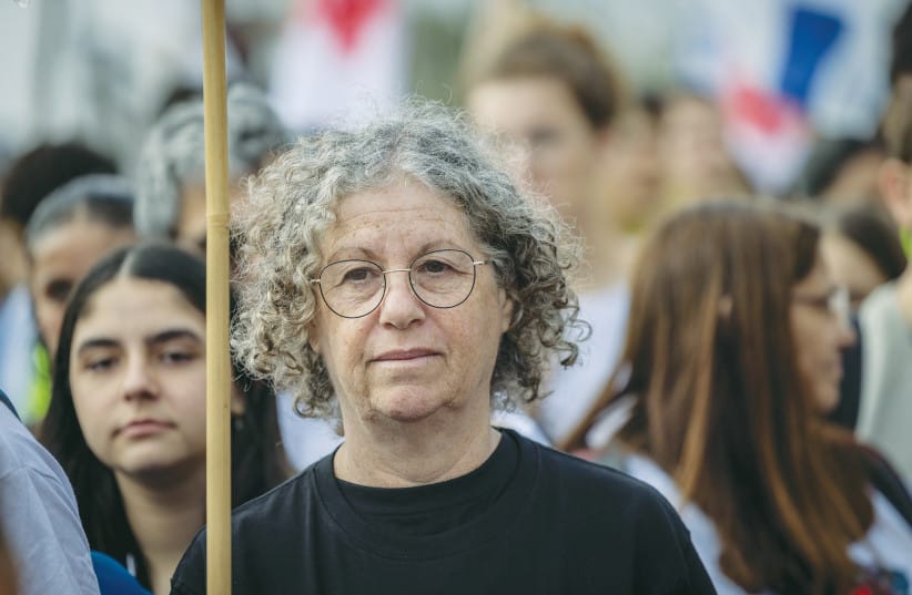 Released Israeli hostage Aviva Siegel marches with teenagers from Kibbutz Kfar Aza to Jerusalem after a five day march from Tel Aviv, December 28, 2023