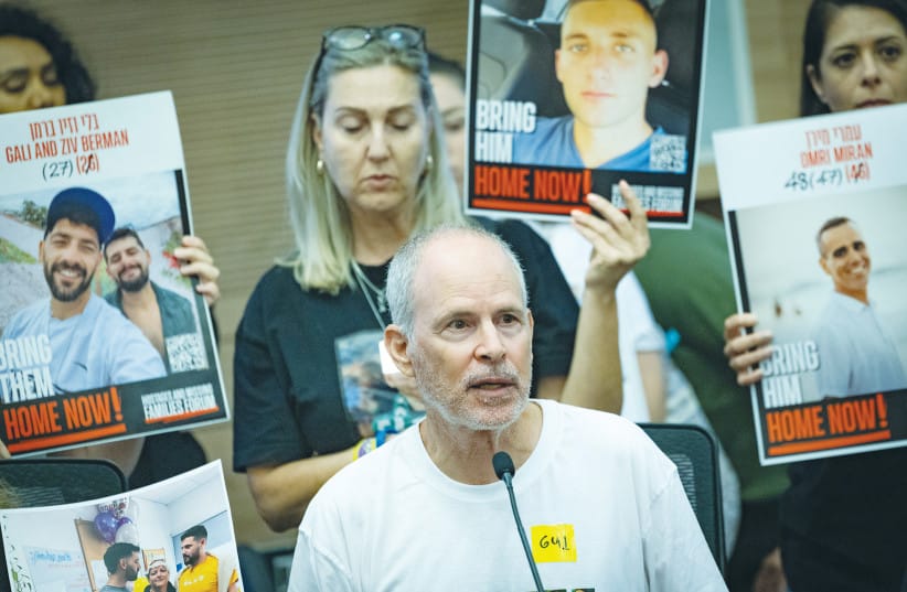 Keith Siegel and families of hostages attend a Security Affairs and Defense committee meeting at the Knesset, in Jerusalem, July 8, 2025.