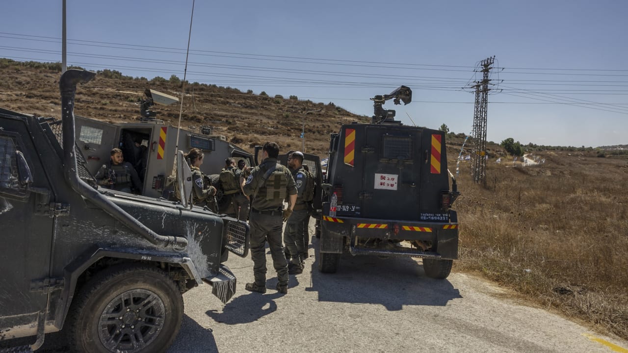 Israeli soldiers and police officers near the scene of a shooting attack at a spring near the Israeli settlement of Neve Tzuf in the West Bank, where an Israeli man was shot by a Palestinian terrorist and later died of his wounds, September 20, 2026.