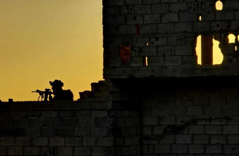 IDF troops operating in Syria's security zone.