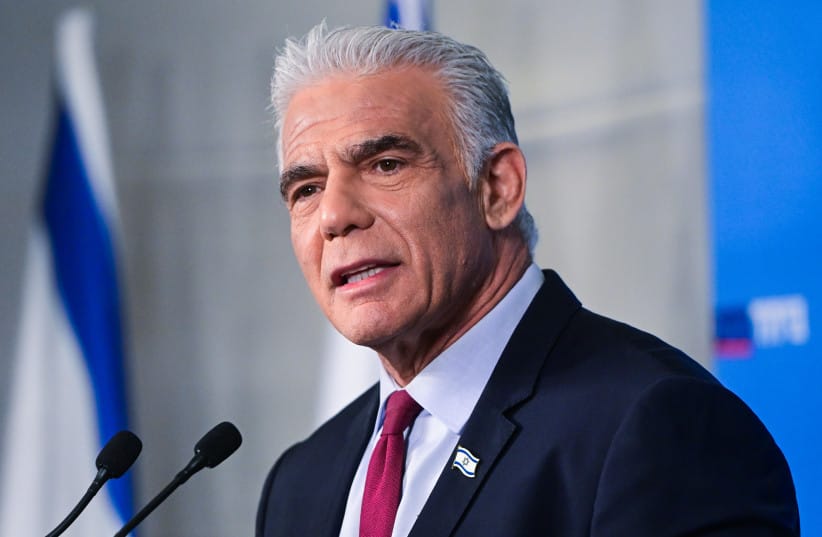 Opposition leader Yair Lapid speaks during a press conference as part of the Together party election campaign in Tel Aviv, central Israel, August 19, 2026.