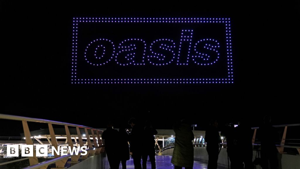 Oasis drone display teases new tour announcement - BBC