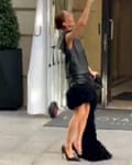Celine Dion sings with fans outside Paris hotel