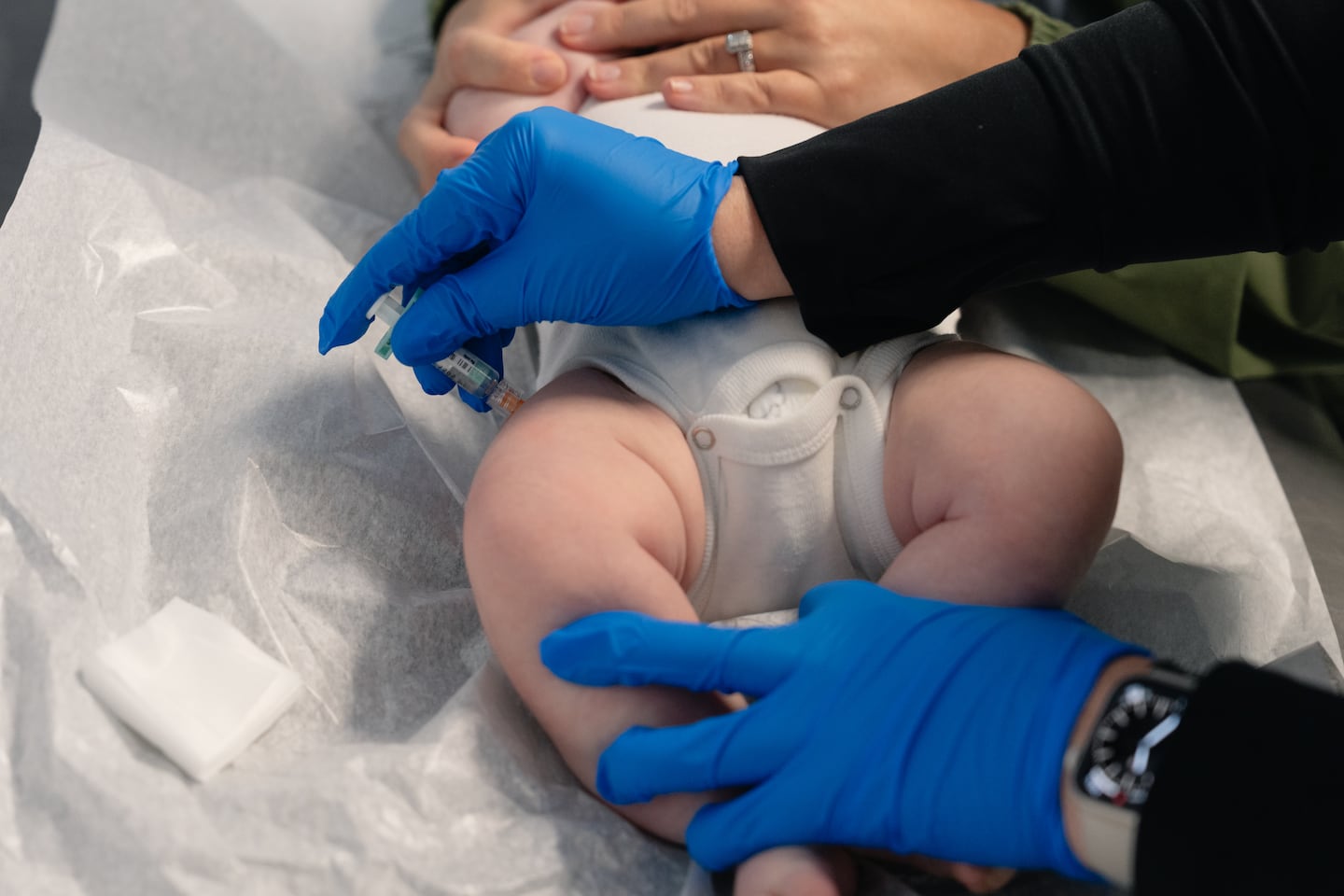 One of Aaron Bornstein’s patients receives a vaccine.