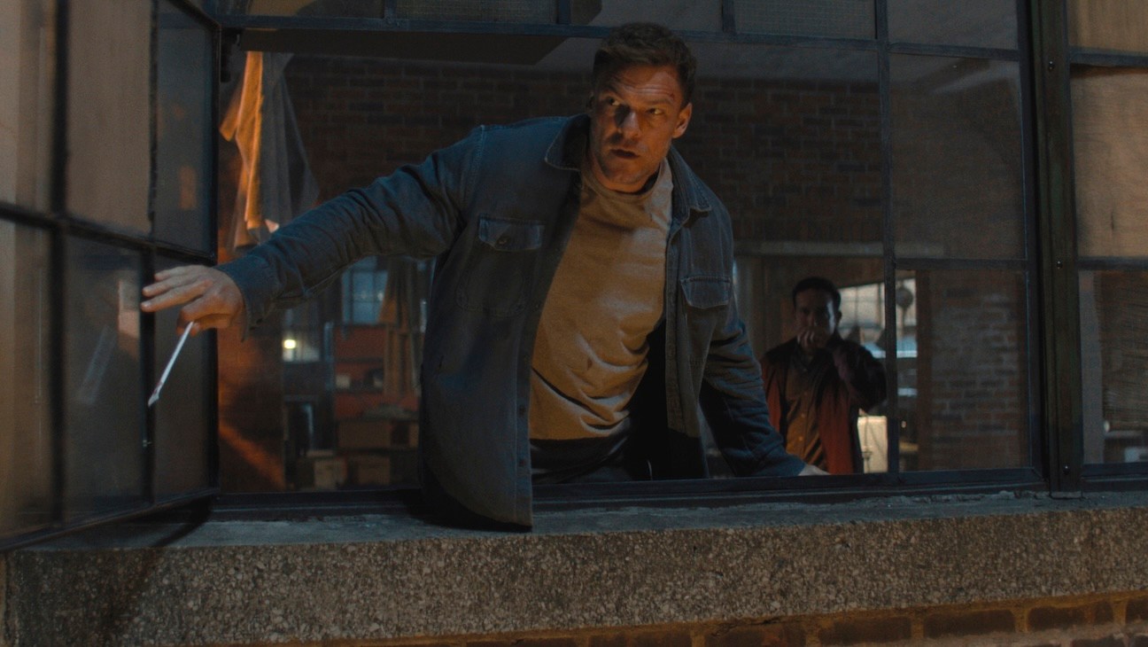 Alan Ritchson as Reacher, Christopher Rodriguez Marquette as Jacob in season 4 of Reacher