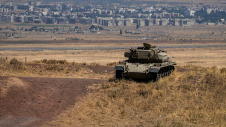 An Israeli tank takes position near the ceasefire line between the Israeli-occupied Golan Heights and Syria, on the Israeli side. Photo: Reuters
