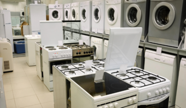 Washing machines, stoves and ovens selling in appliance store.