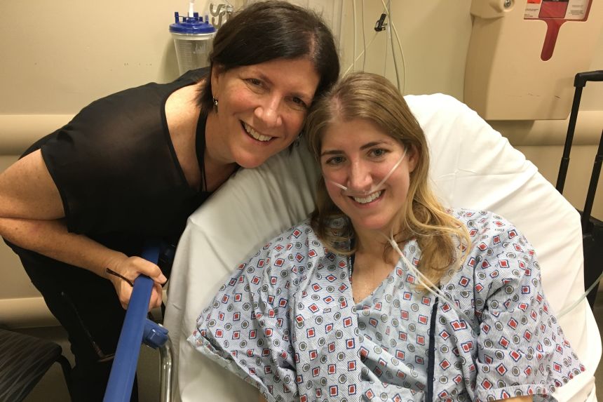 Mallory pictured in hospital with her mother, Diane Shader Smith.