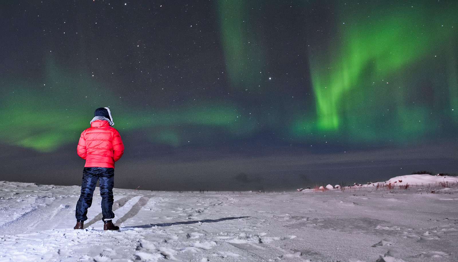 How do cosmic rays from outer space enter Earth's atmosphere?