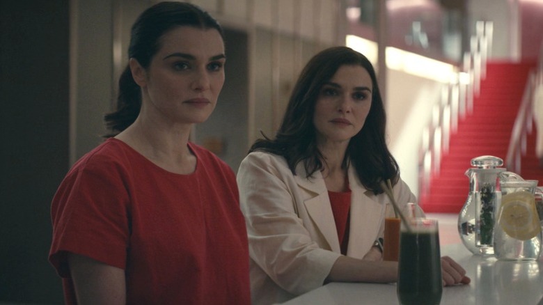 Beverly and Elliot sitting at the cafeteria counter on Dead Ringers S1E3