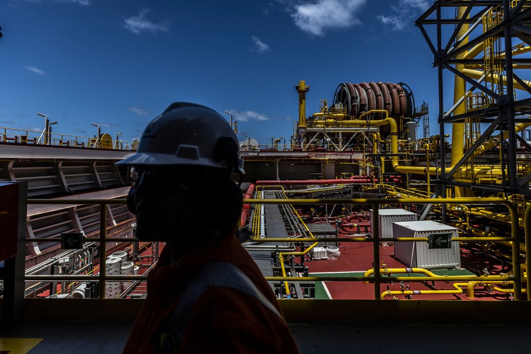 A Petrobras worker tours the Almirante Tamandare floating production and storage vessel, operated by SBM Offshore NV for Petroleo Brasileiro SA, in the Buzios field off the coast of Rio de Janeiro, Brazil, on Friday, Oct. 24, 2025.