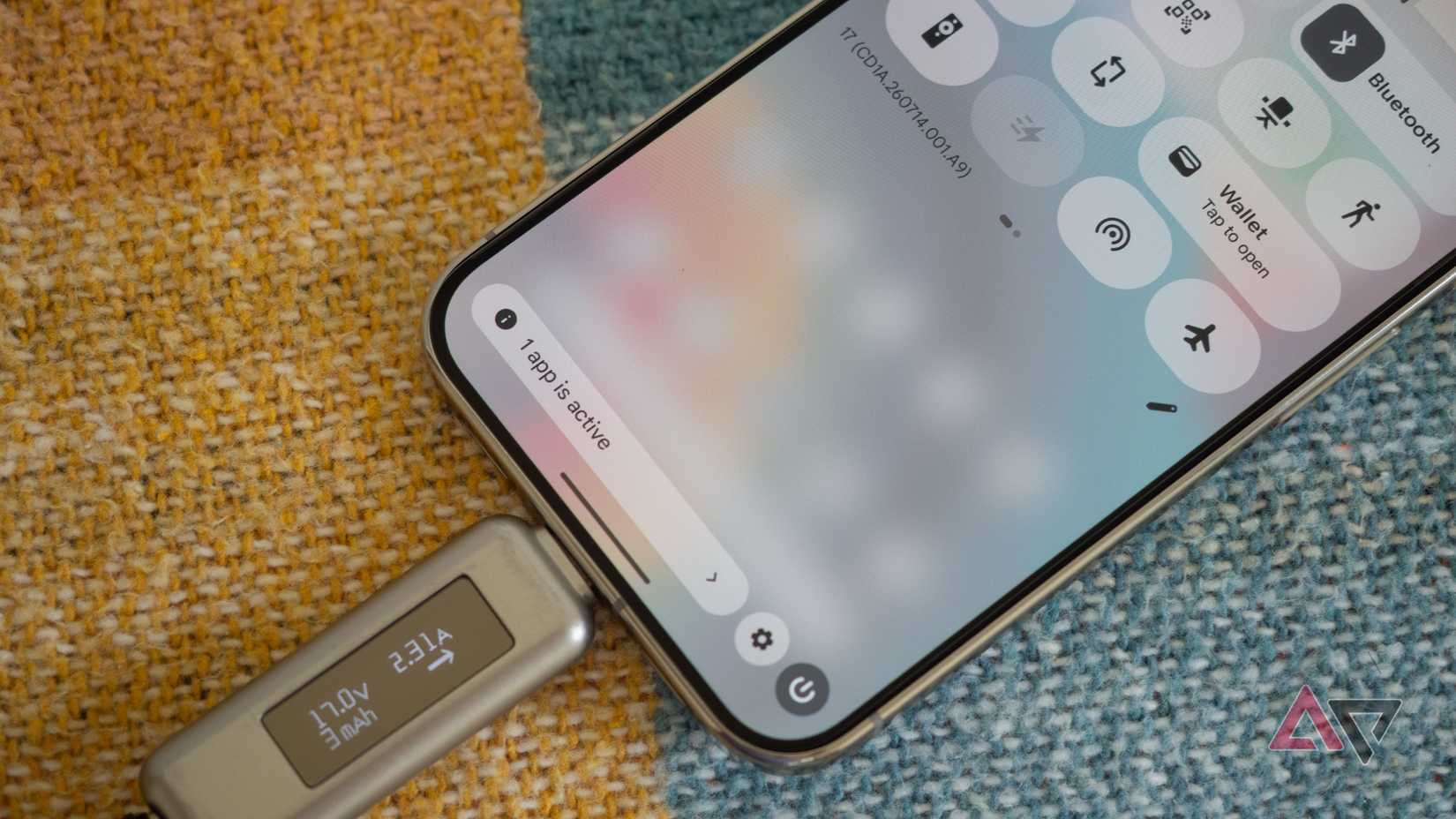 Google Pixel 11 Pro XL showing the Extreme Charging quick settings toggle as Unavailable while it charges rapidly at 17V
